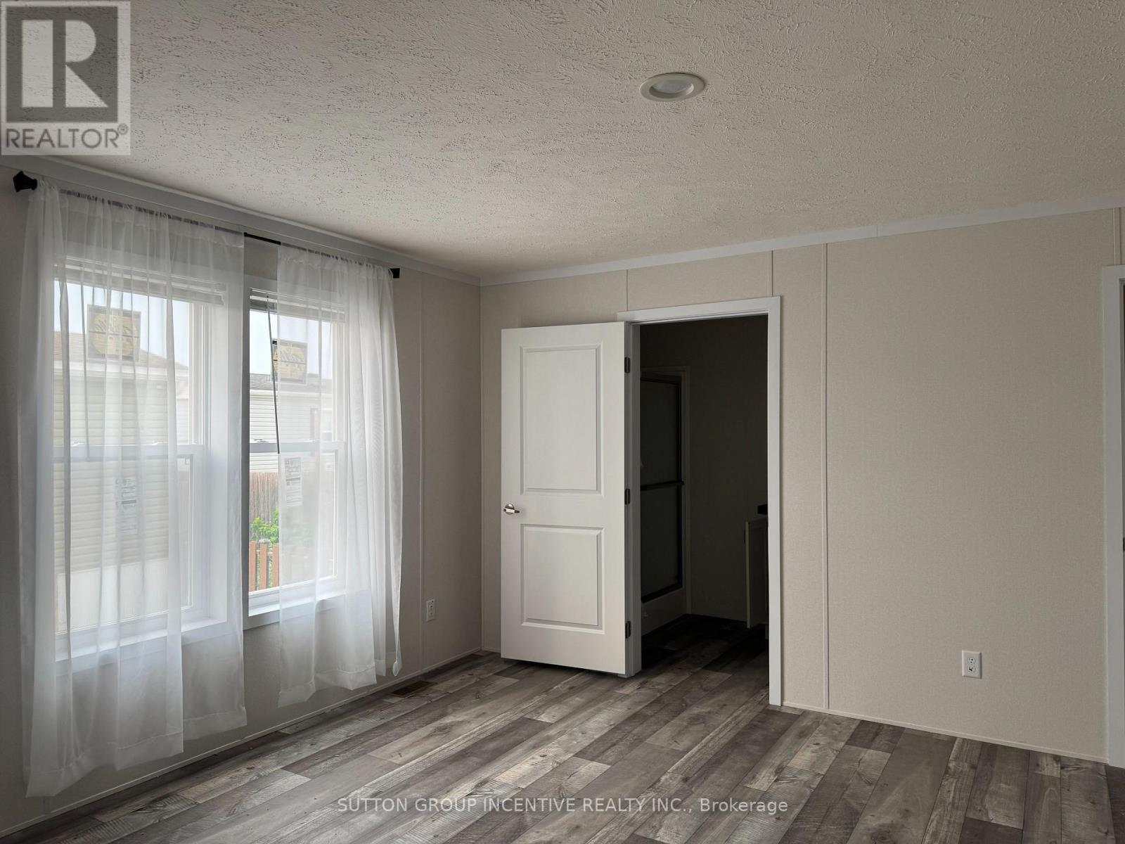 Bedroom 1 with ensuite - 182 Remi Crescent, Timmins, ON - Indoor Photo Showing Other Room