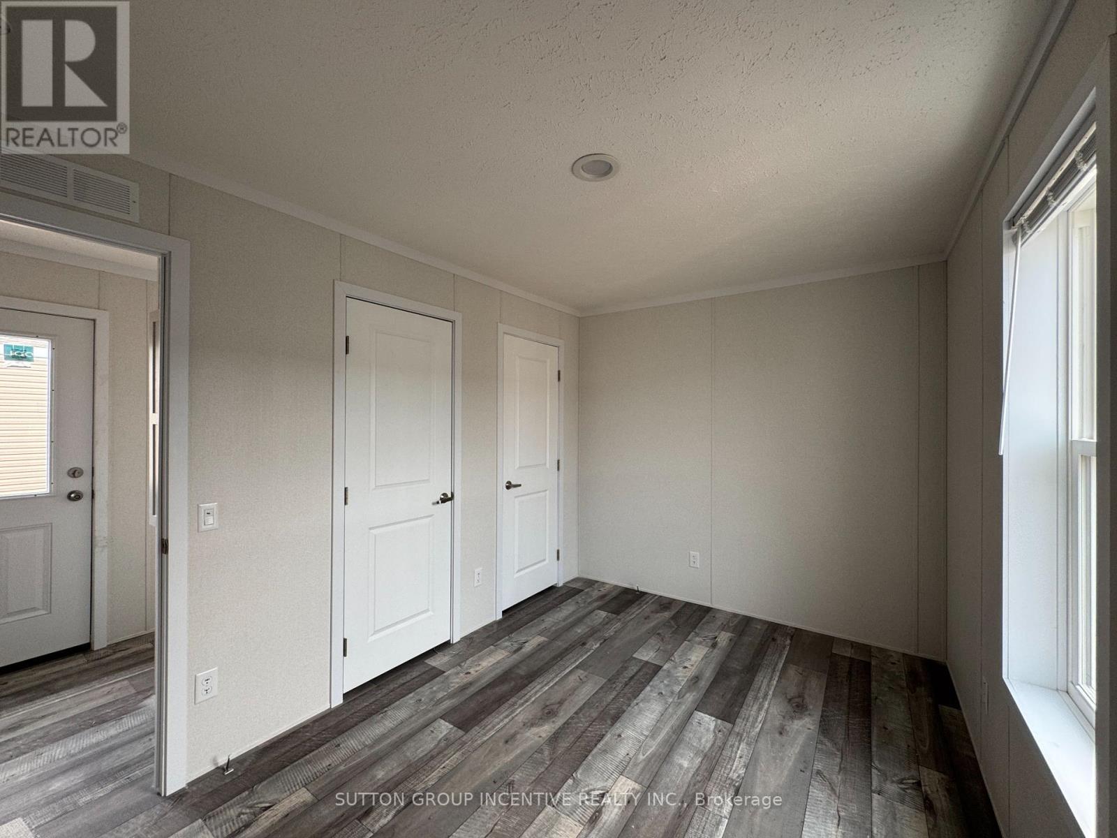 Bedroom 2 with 2 closets and ensuite - 182 Remi Crescent, Timmins, ON - Indoor Photo Showing Other Room