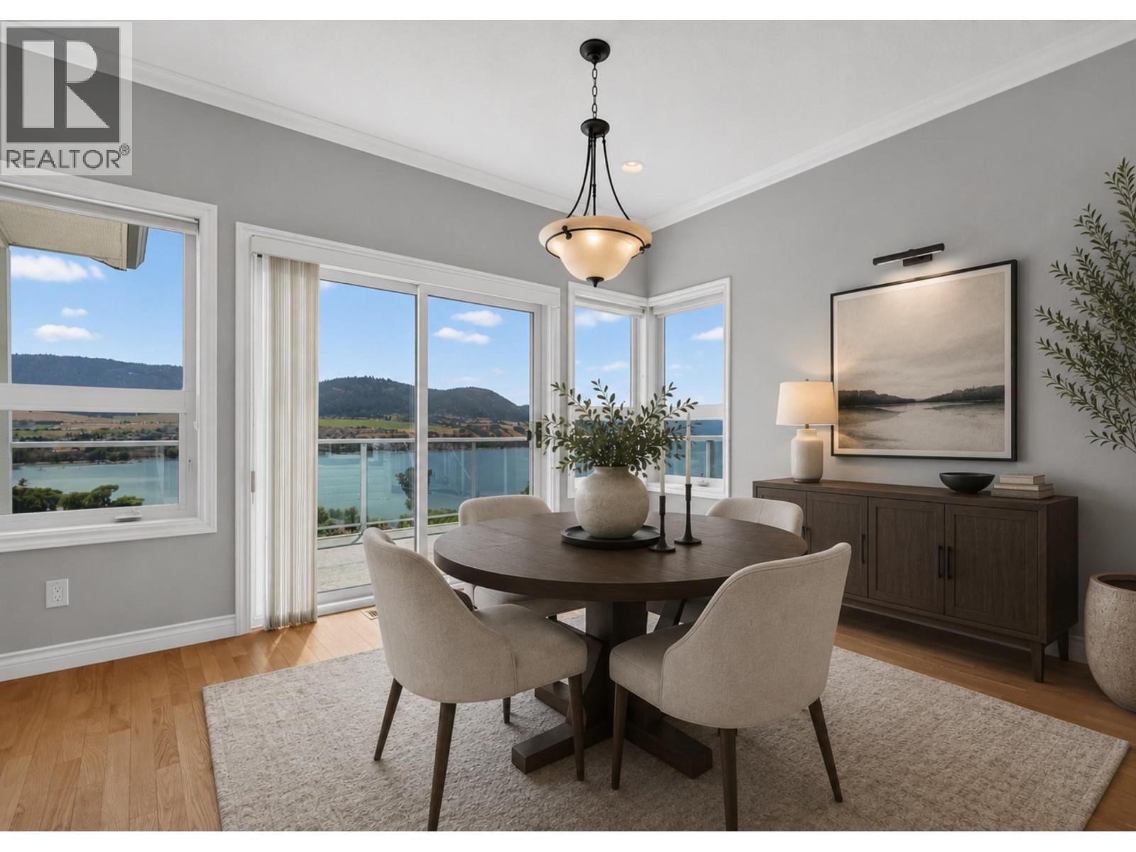 Dining room virtually reimagined with decor. - 7083 Jasper Drive, Vernon, BC - Indoor Photo Showing Dining Room
