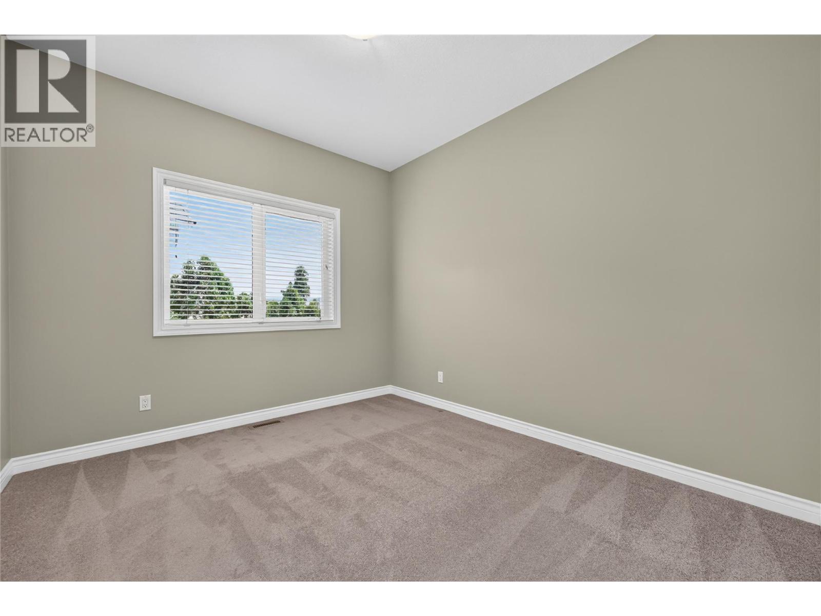 2nd bedroom on main floor. - 7083 Jasper Drive, Vernon, BC - Indoor Photo Showing Other Room