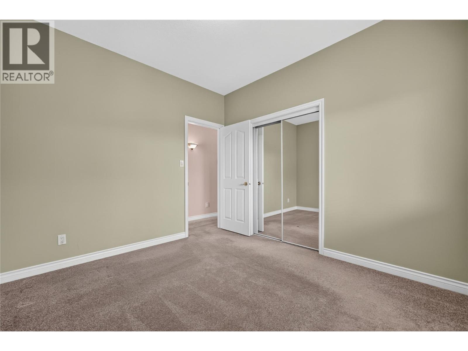 2nd bedroom on main floor. - 7083 Jasper Drive, Vernon, BC - Indoor Photo Showing Other Room