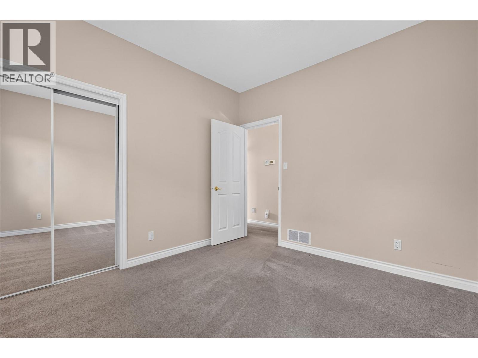3rd bedroom on main floor. - 7083 Jasper Drive, Vernon, BC - Indoor Photo Showing Other Room