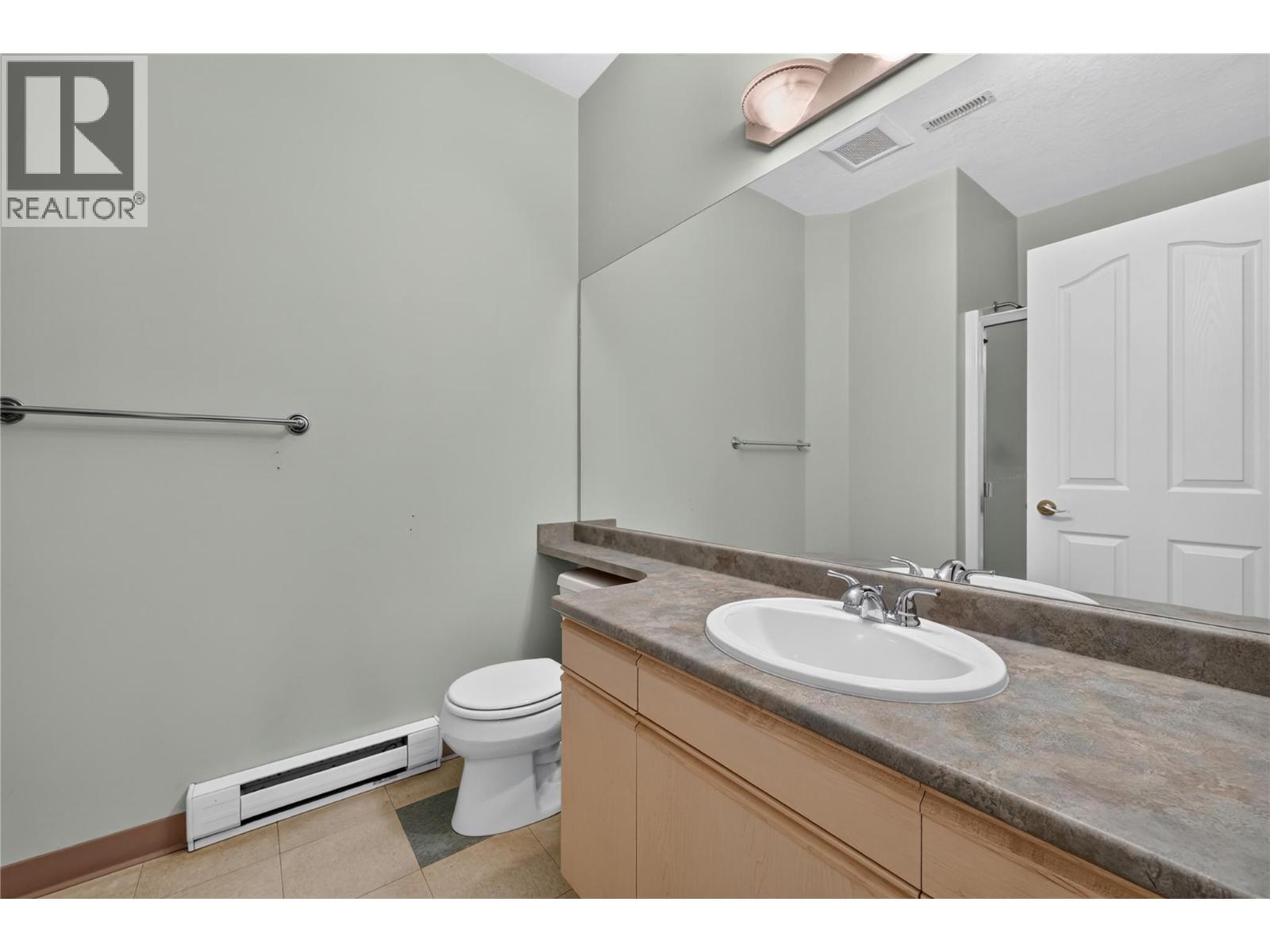 Full bathroom on lower level. - 7083 Jasper Drive, Vernon, BC - Indoor Photo Showing Bathroom