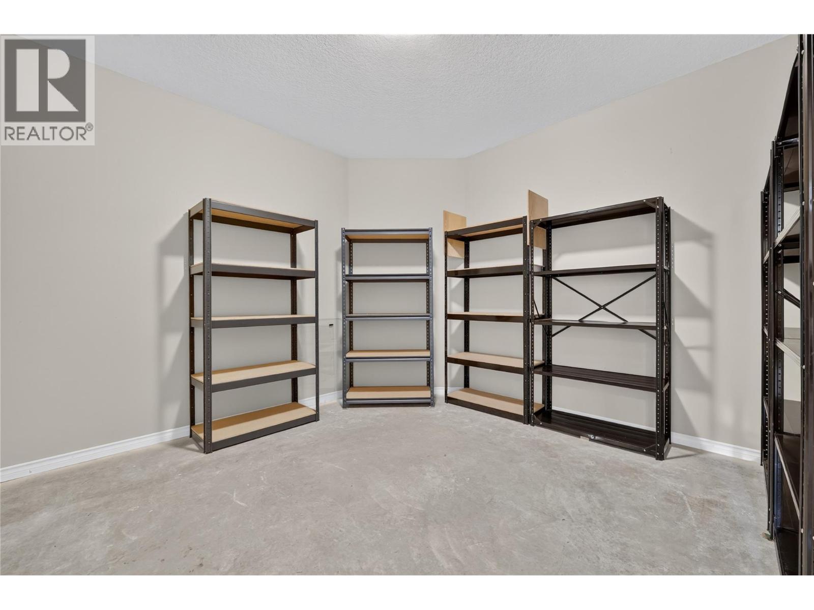 Huge storage room with shelving. - 7083 Jasper Drive, Vernon, BC - Indoor Photo Showing Other Room