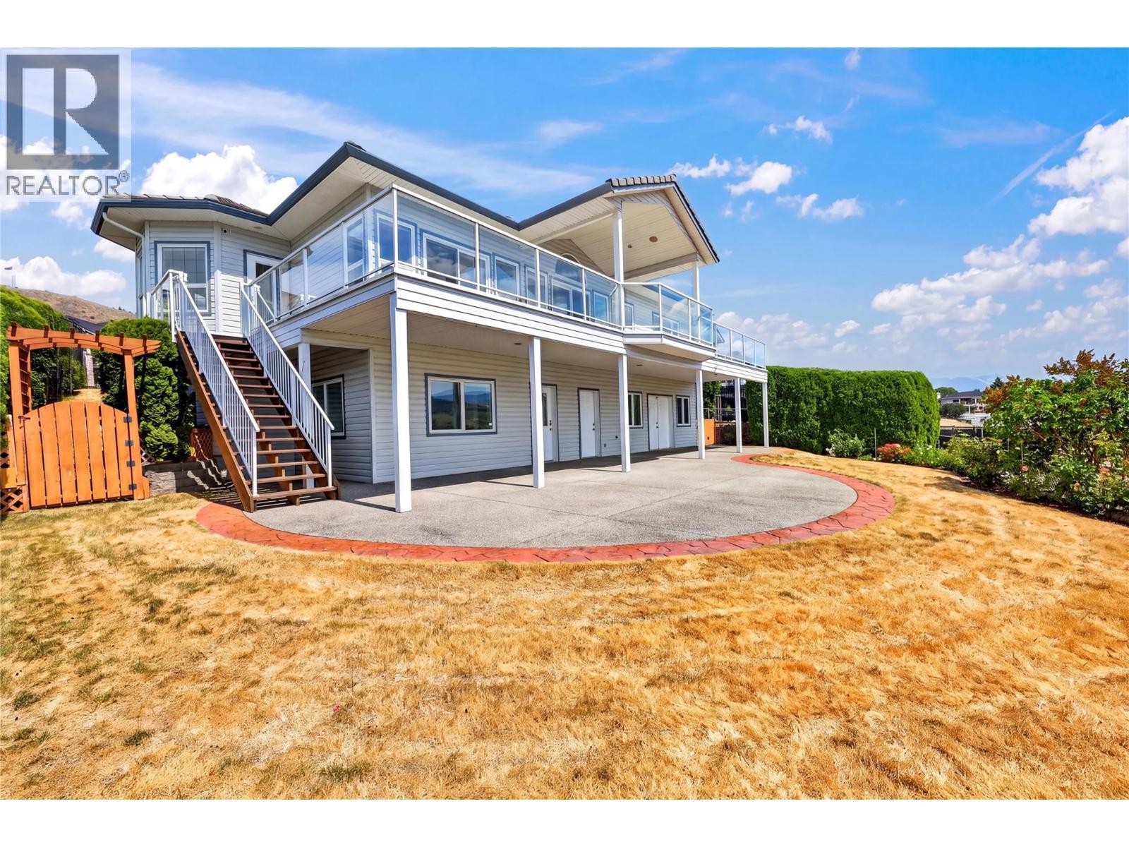 Perfect yard for kids to play, entertaining guests, or to take in the views. - 7083 Jasper Drive, Vernon, BC - Outdoor