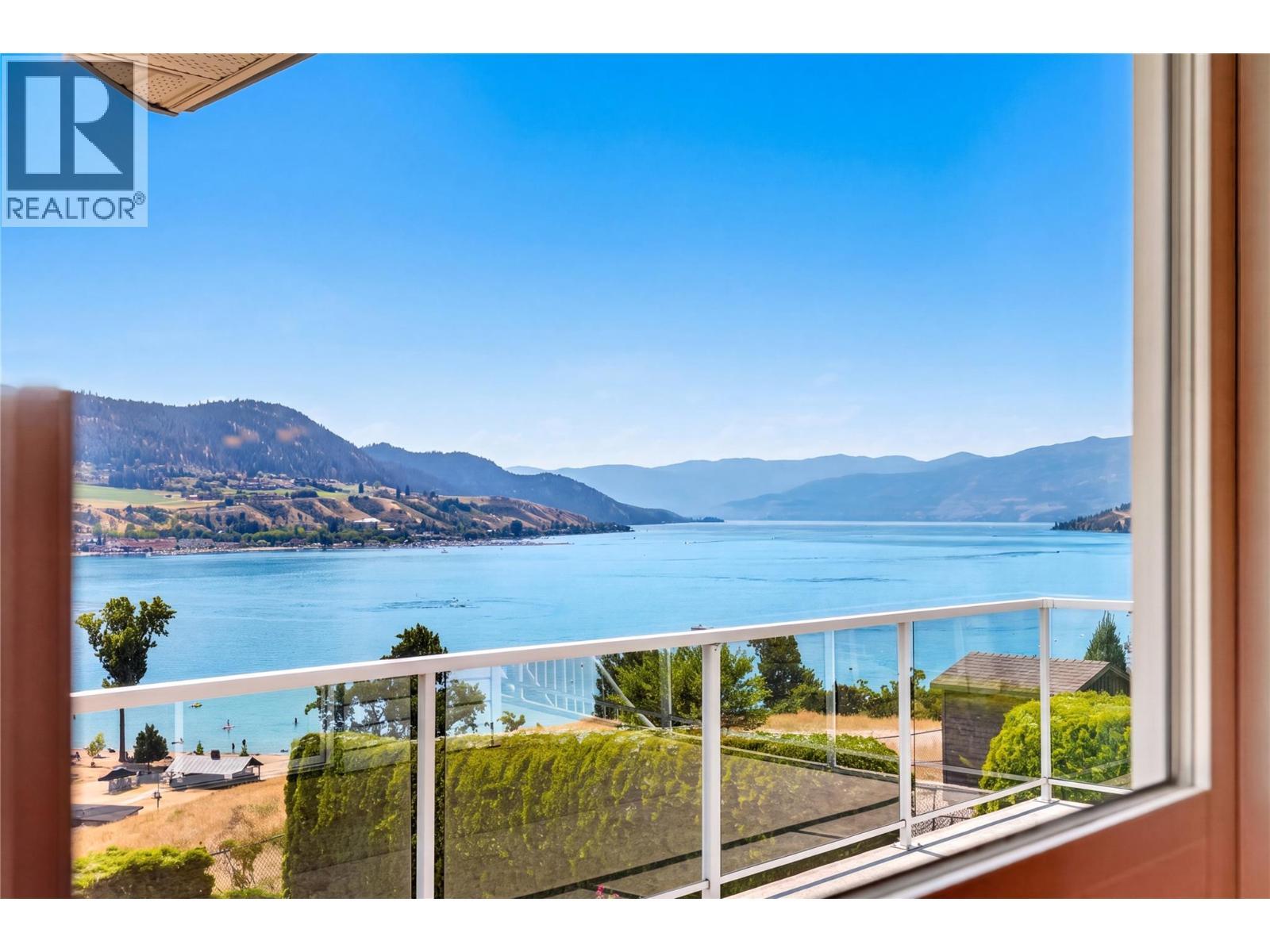 Stunning views of Okanagan Lake. - 7083 Jasper Drive, Vernon, BC - Outdoor With Body Of Water With View