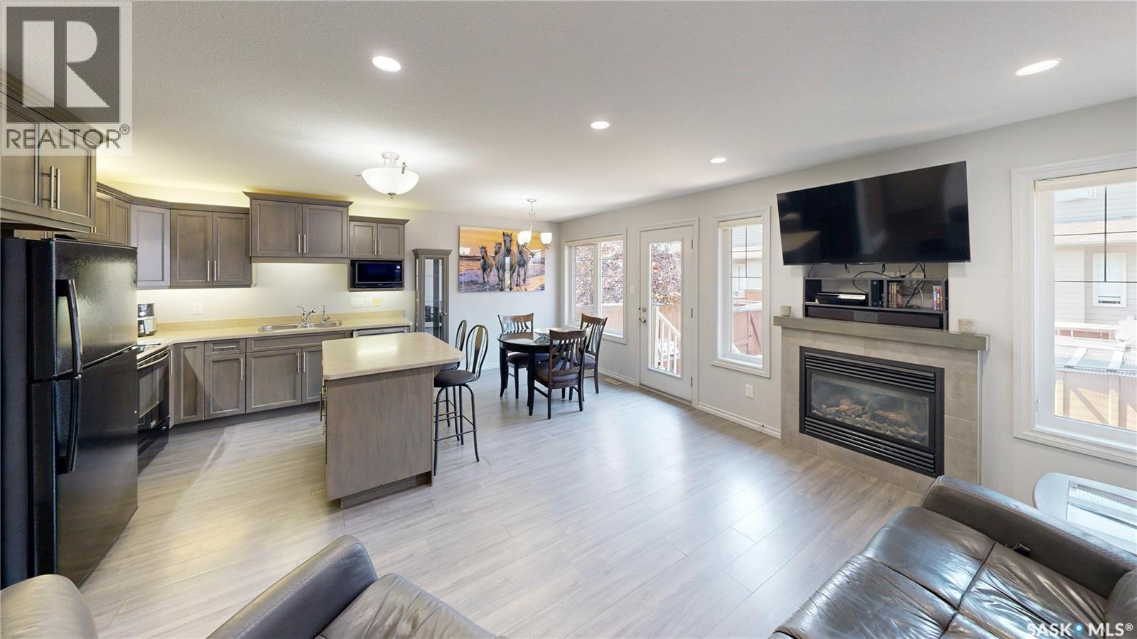 134 4100 Sandhill Crescent, Regina, SK - Indoor With Fireplace