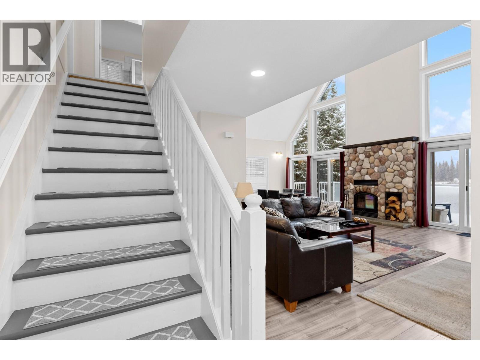 9315 Paradise Road, Kelowna, BC - Indoor Photo Showing Other Room With Fireplace