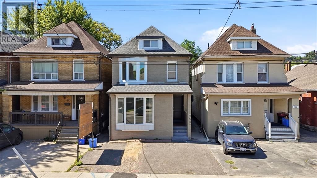 968 Main Street E, Hamilton, ON - Outdoor With Facade