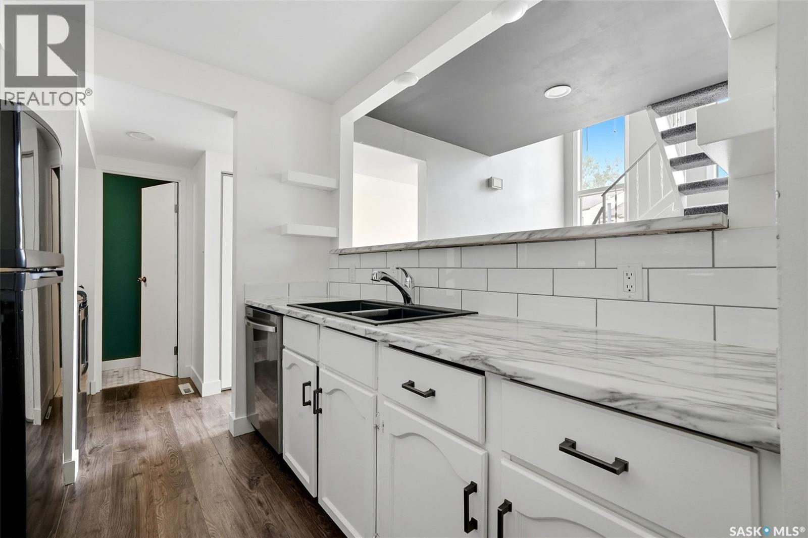 5136 10Th Avenue, Regina, SK - Indoor Photo Showing Kitchen With Double Sink