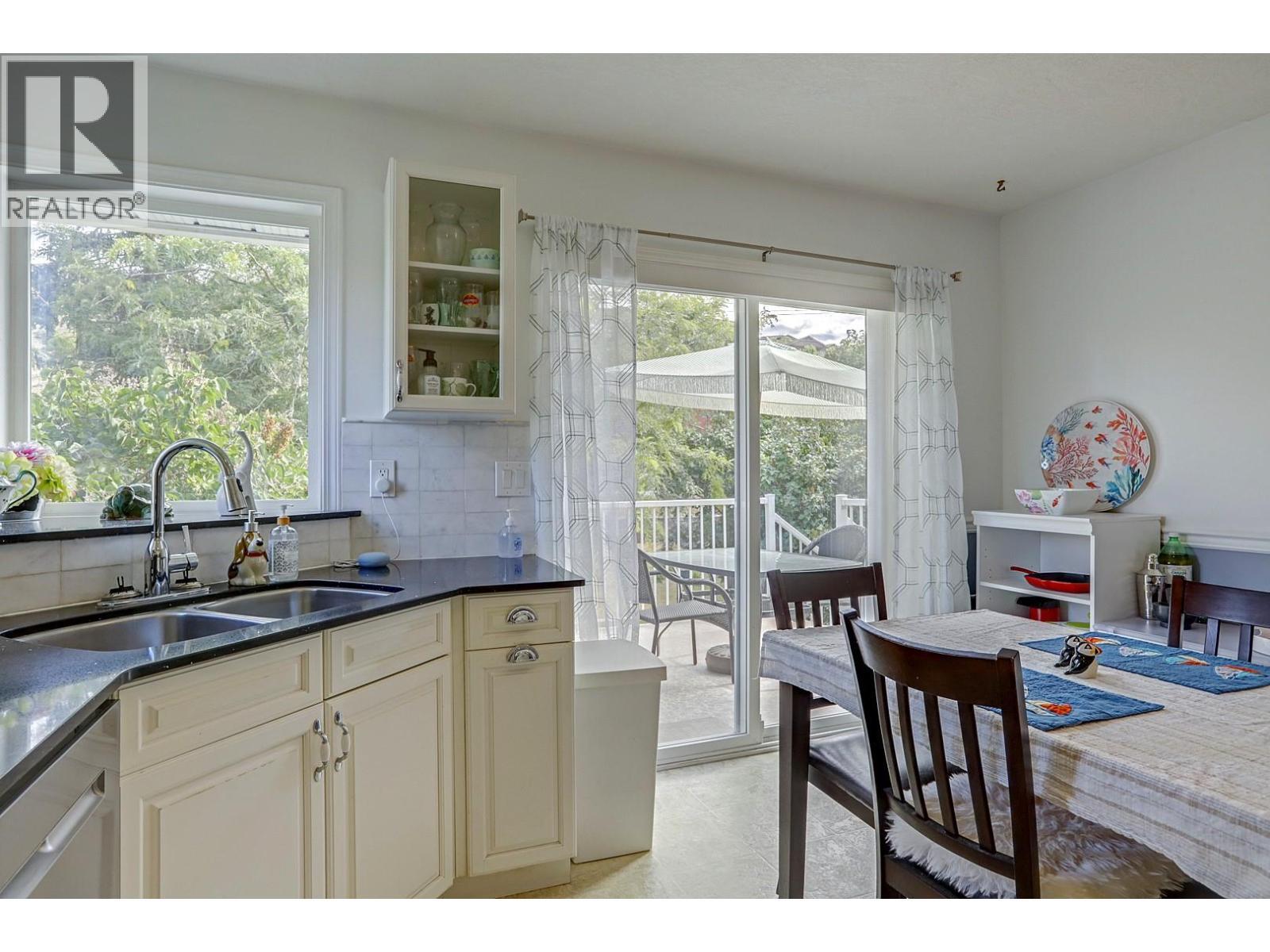 8405 Postill Drive, Coldstream, BC - Indoor Photo Showing Kitchen With Double Sink