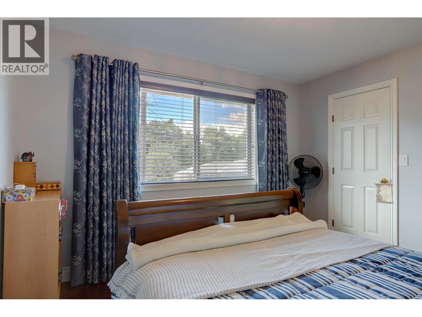8405 Postill Drive, Coldstream, BC - Indoor Photo Showing Bedroom