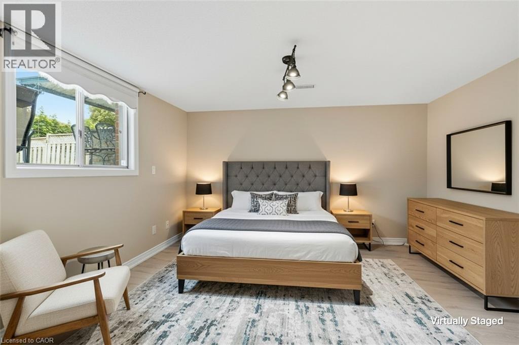 In-Law Suite Bedroom Virtually Staged - 5 Manor Crescent, Grimsby, ON - Indoor Photo Showing Bedroom