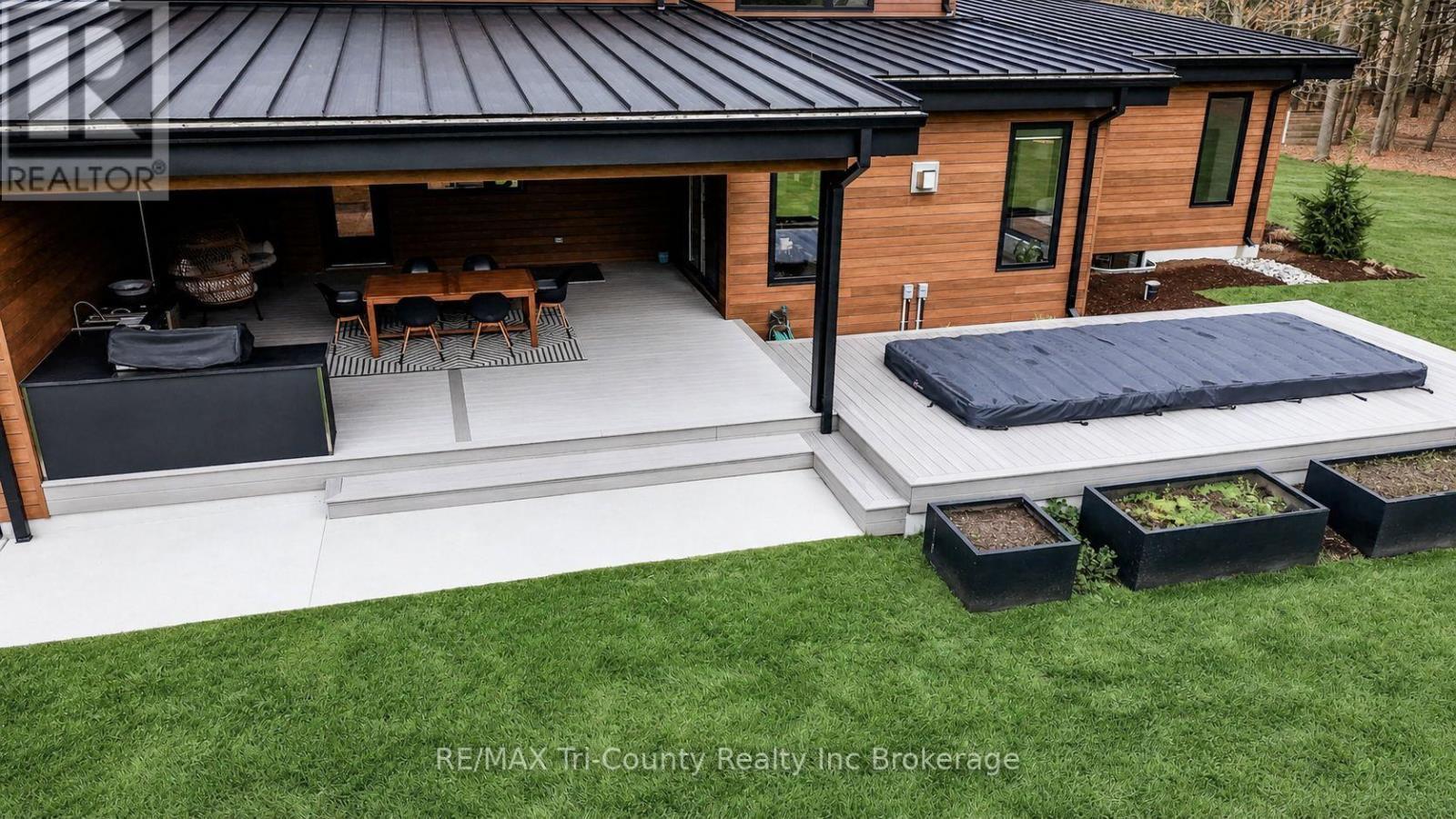 Back covered patio & Swim Spa - 8987 Powers Road, Central Elgin, ON - Outdoor With Deck Patio Veranda