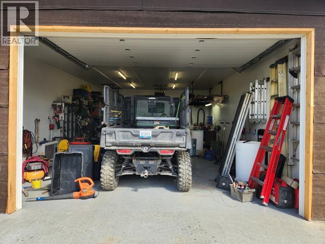 242 Dawson Drive, Faro, YT - Indoor Photo Showing Garage