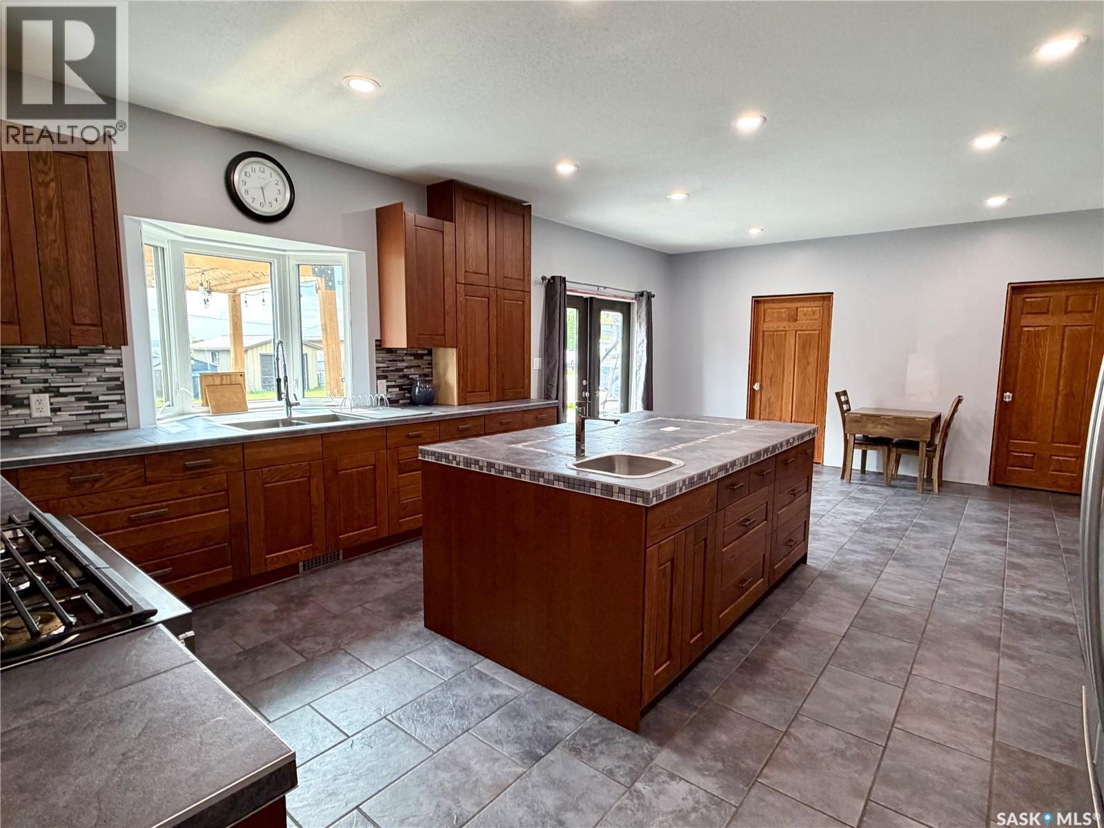 123 Chitek Drive, Chitek Lake, SK - Indoor Photo Showing Kitchen With Double Sink