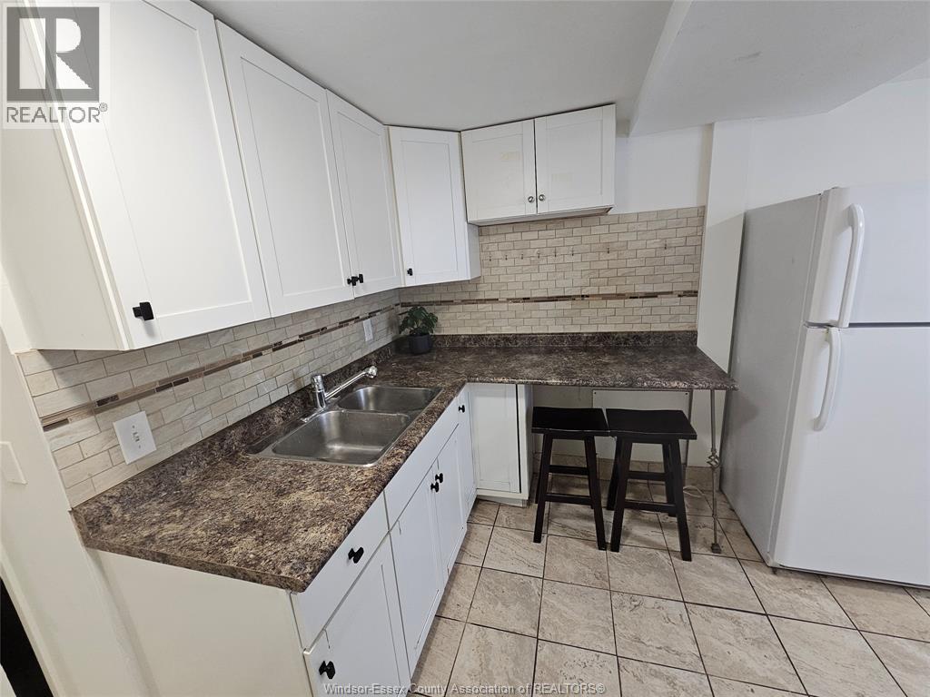 1143 Langlois, Windsor, ON - Indoor Photo Showing Kitchen With Double Sink