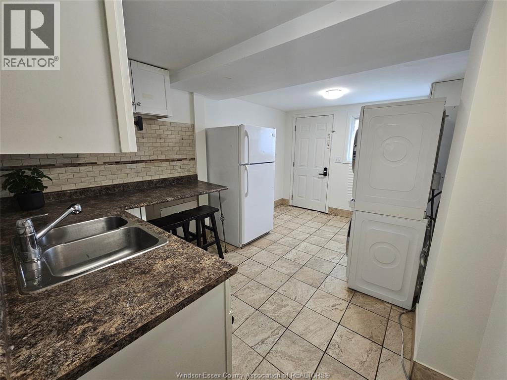 1143 Langlois, Windsor, ON - Indoor Photo Showing Kitchen With Double Sink