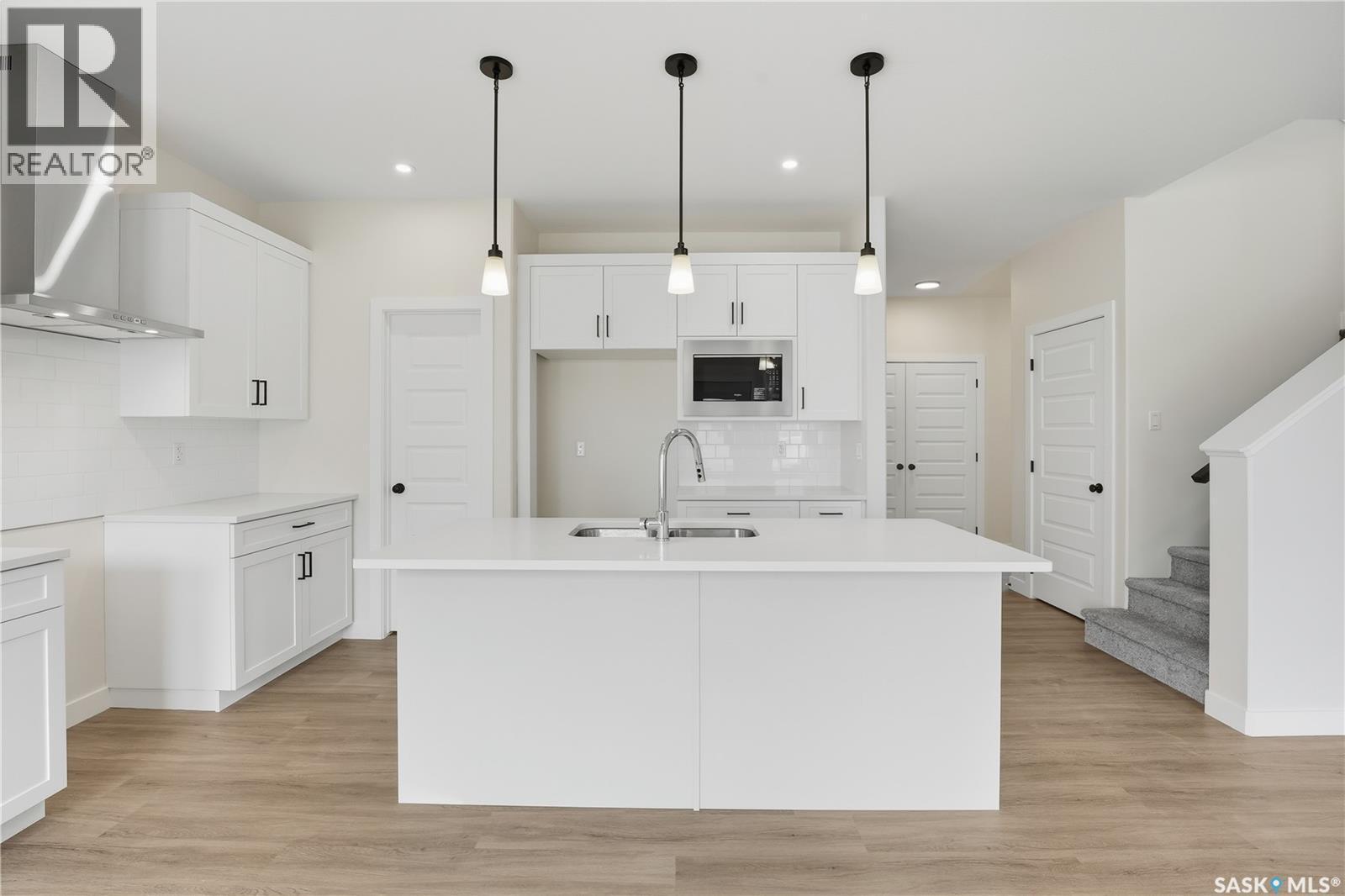 692 Nazarali Lane, Saskatoon, SK - Indoor Photo Showing Kitchen With Upgraded Kitchen