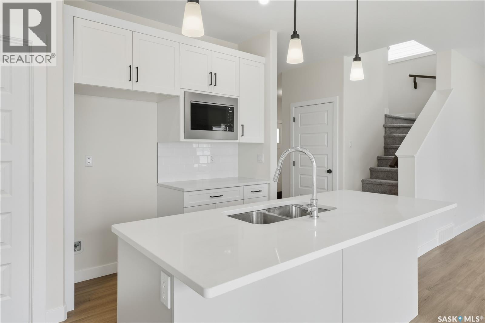 692 Nazarali Lane, Saskatoon, SK - Indoor Photo Showing Kitchen With Double Sink With Upgraded Kitchen