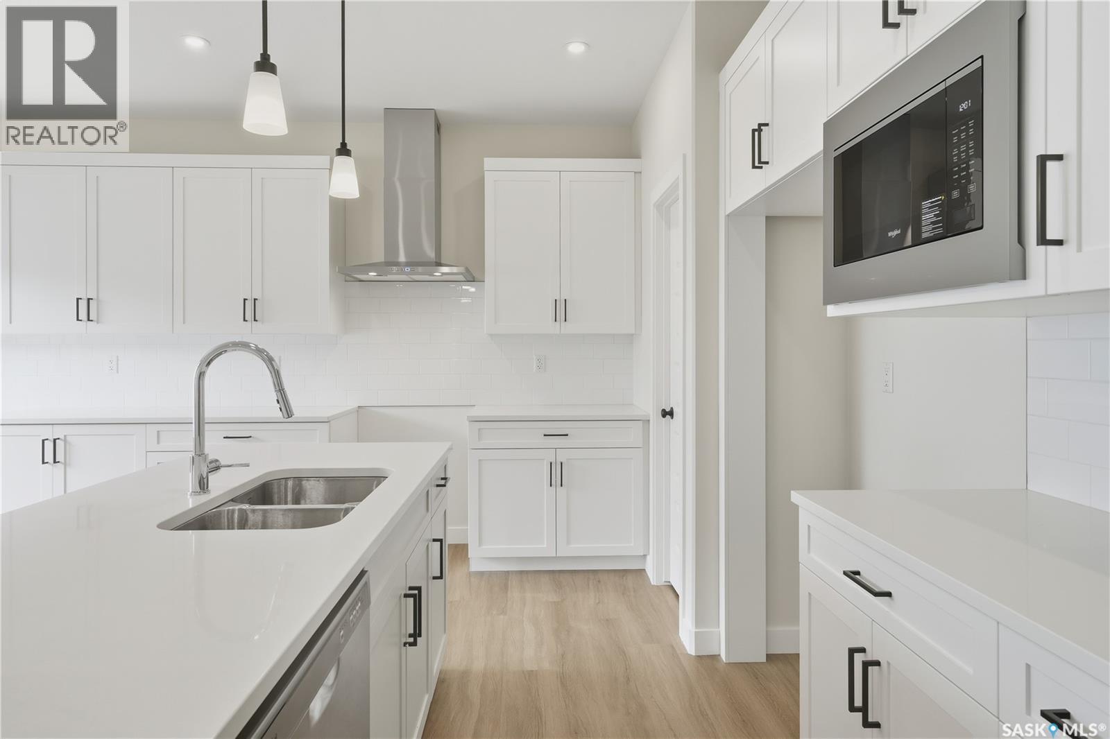692 Nazarali Lane, Saskatoon, SK - Indoor Photo Showing Kitchen With Double Sink With Upgraded Kitchen