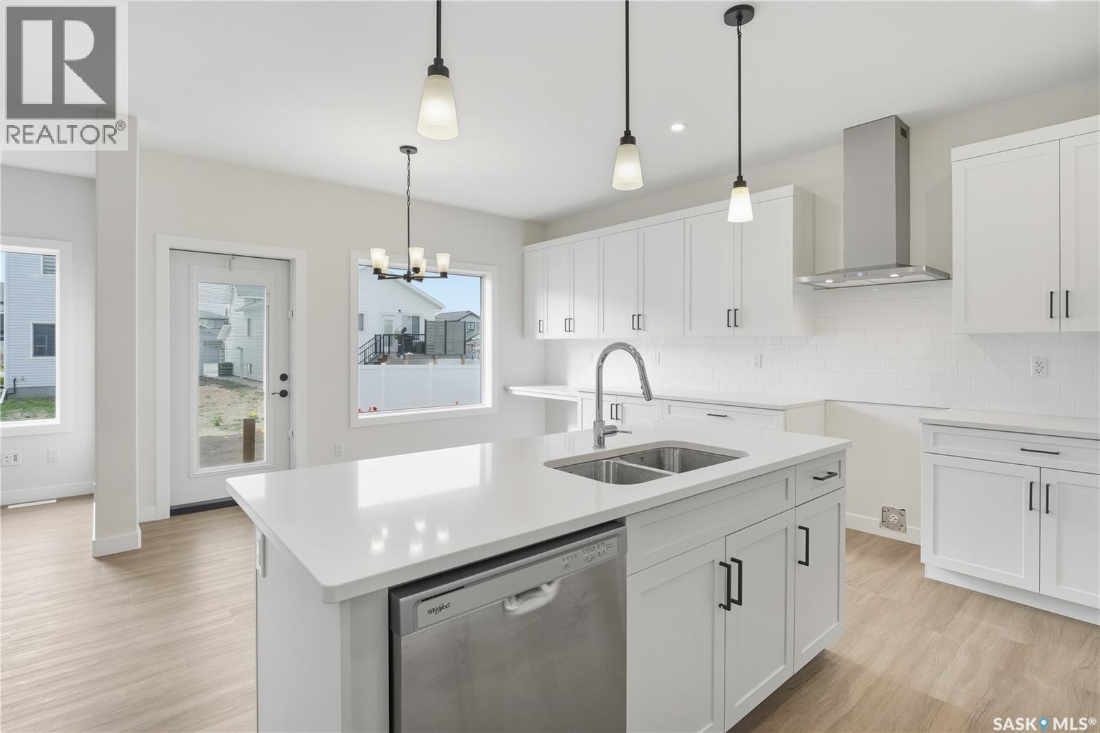 692 Nazarali Lane, Saskatoon, SK - Indoor Photo Showing Kitchen With Double Sink With Upgraded Kitchen