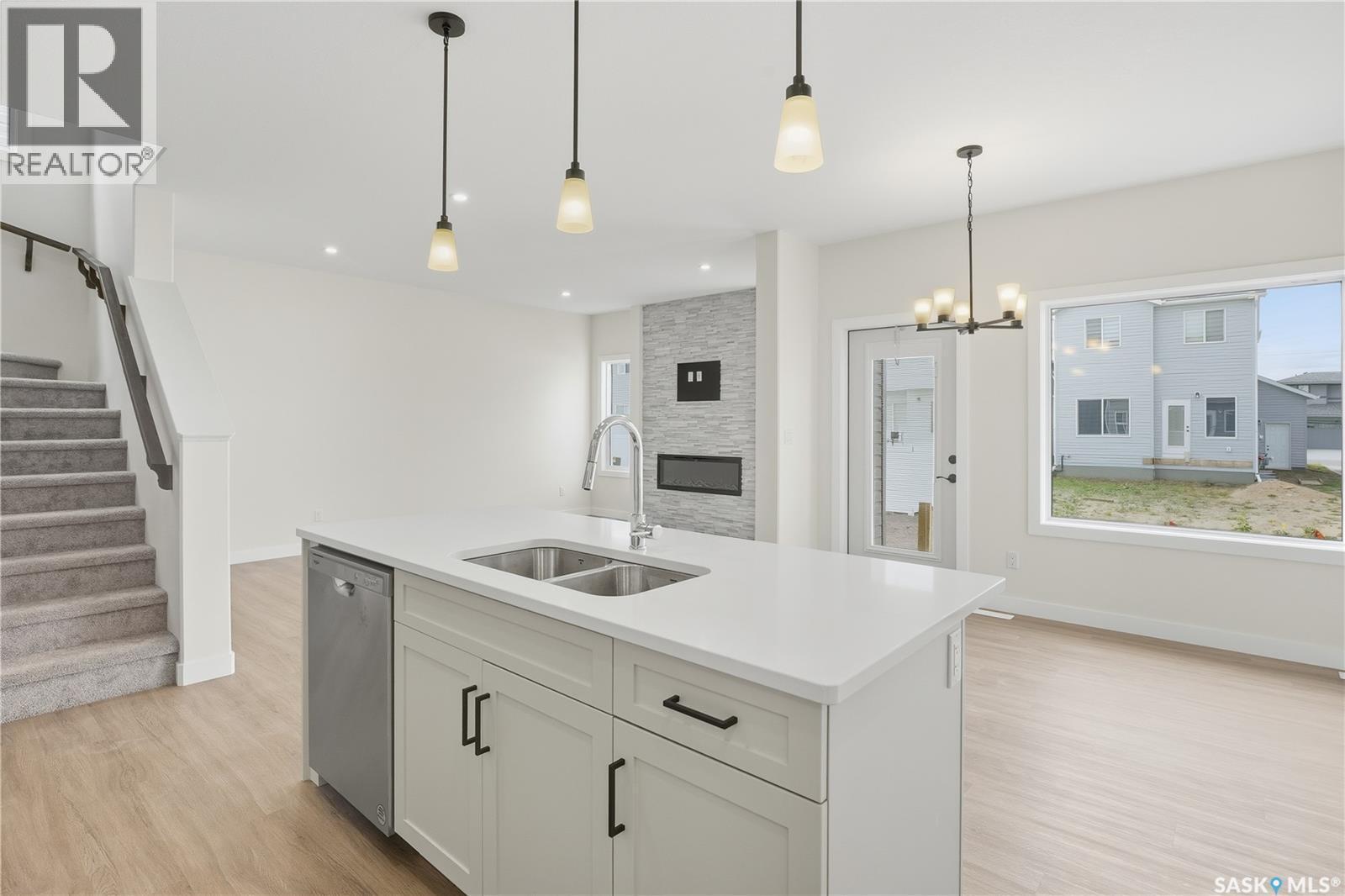 692 Nazarali Lane, Saskatoon, SK - Indoor Photo Showing Kitchen With Double Sink