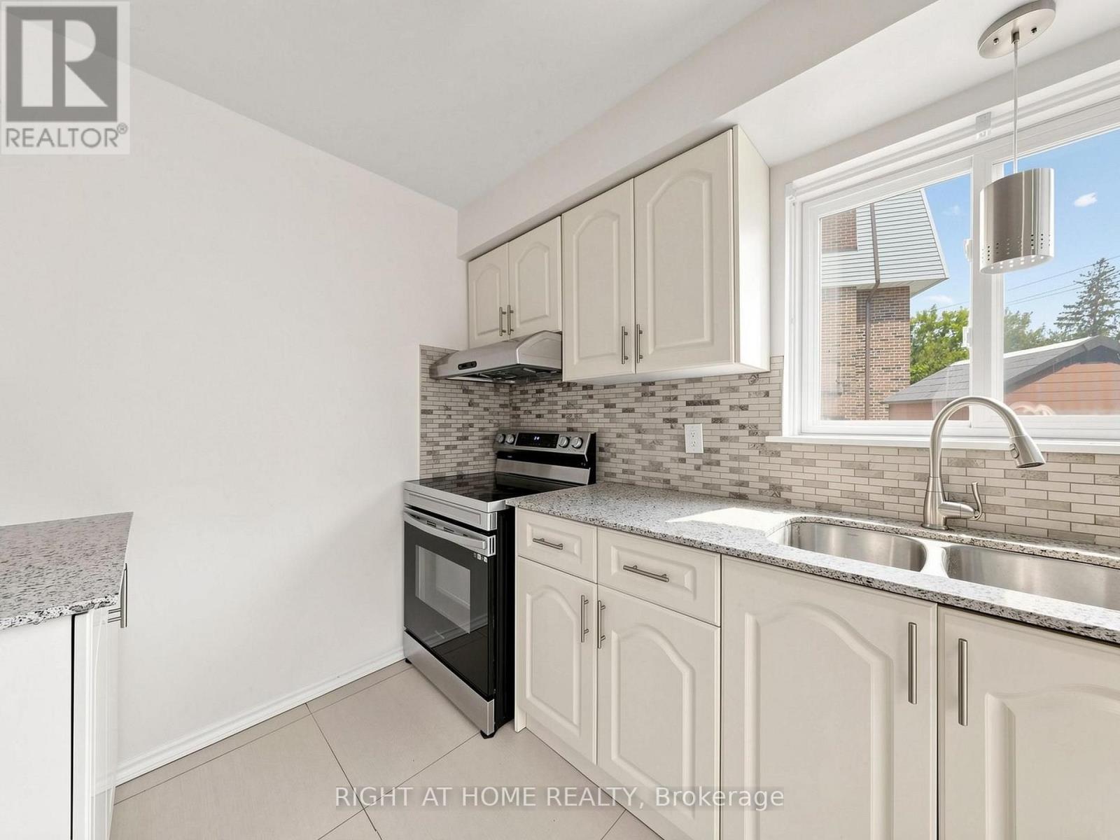 148 Sexton Crescent, Toronto, ON - Indoor Photo Showing Kitchen With Double Sink
