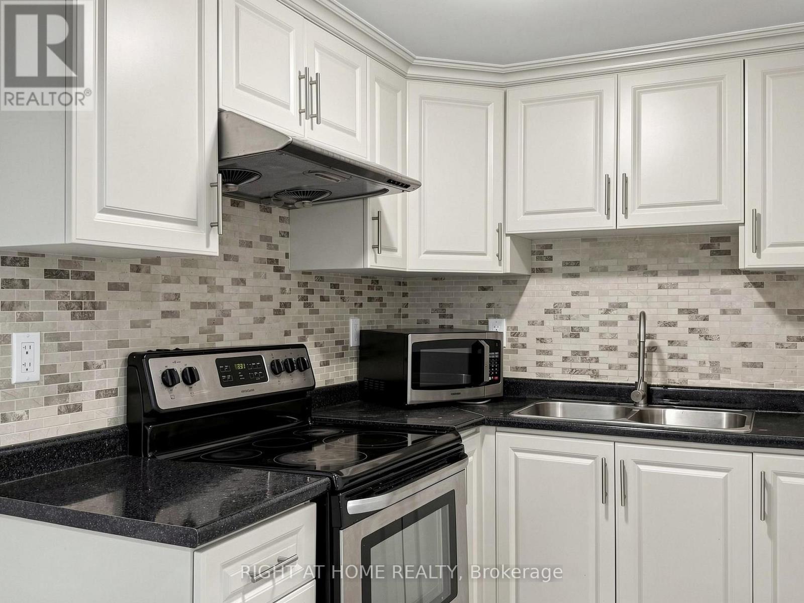 148 Sexton Crescent, Toronto, ON - Indoor Photo Showing Kitchen With Double Sink