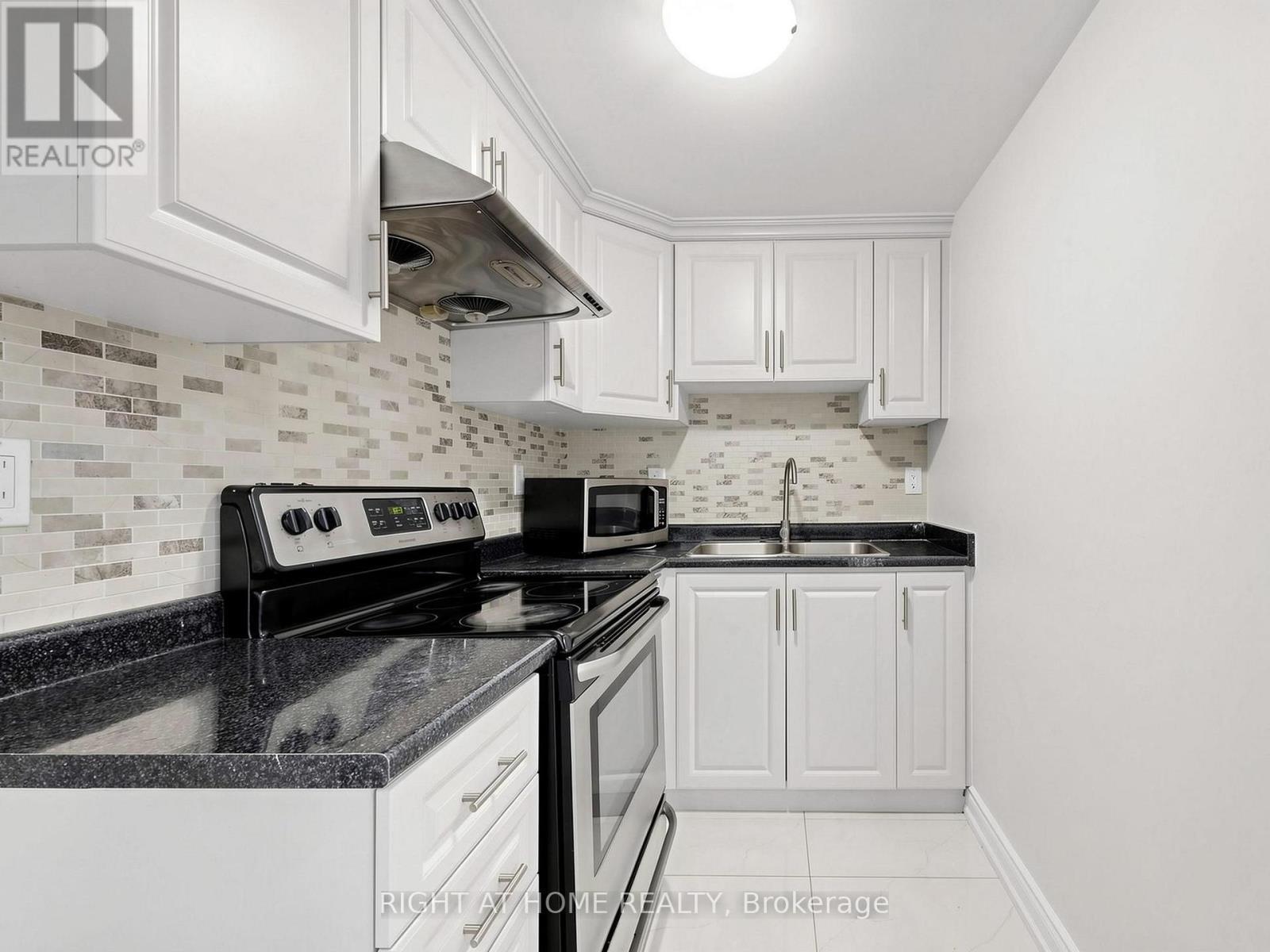 148 Sexton Crescent, Toronto, ON - Indoor Photo Showing Kitchen With Double Sink