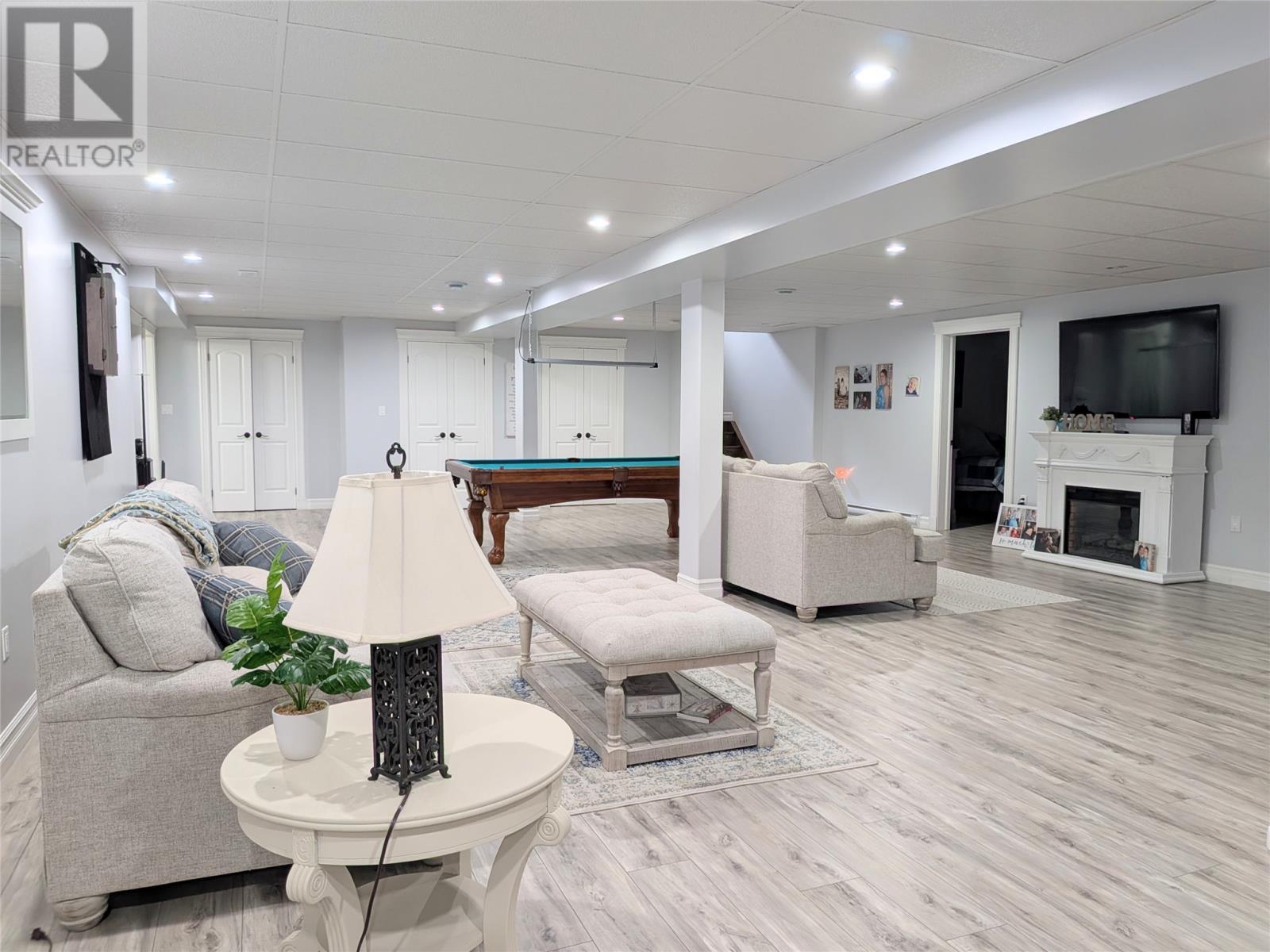 23 Seaside Drive, Kippens, NL - Indoor With Fireplace