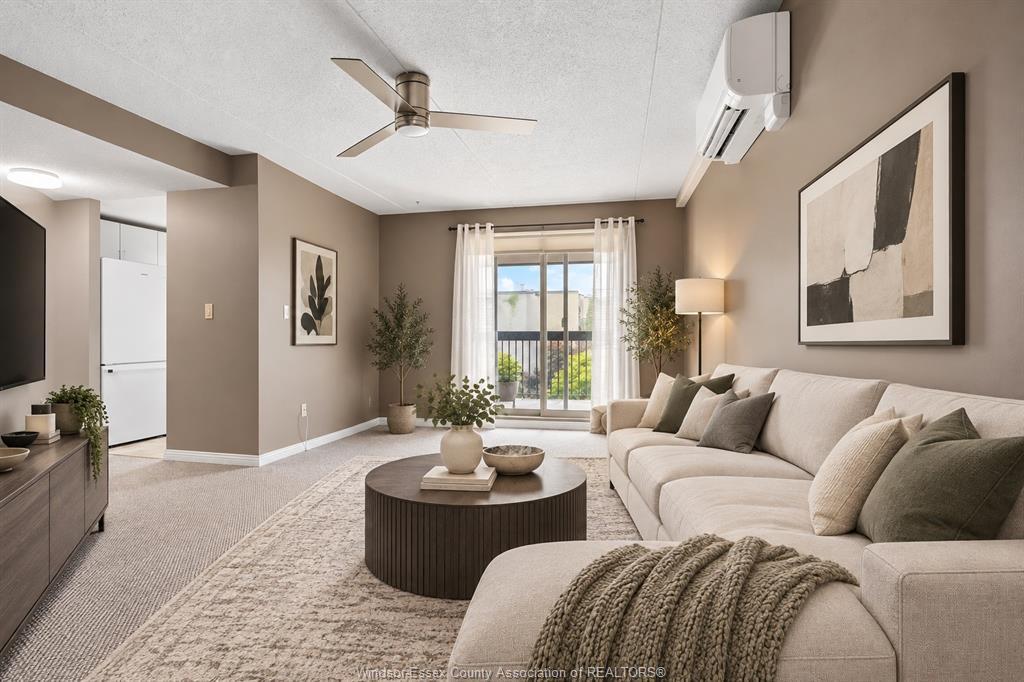 502-1905 Normandy, Lasalle, ON - Indoor Photo Showing Living Room