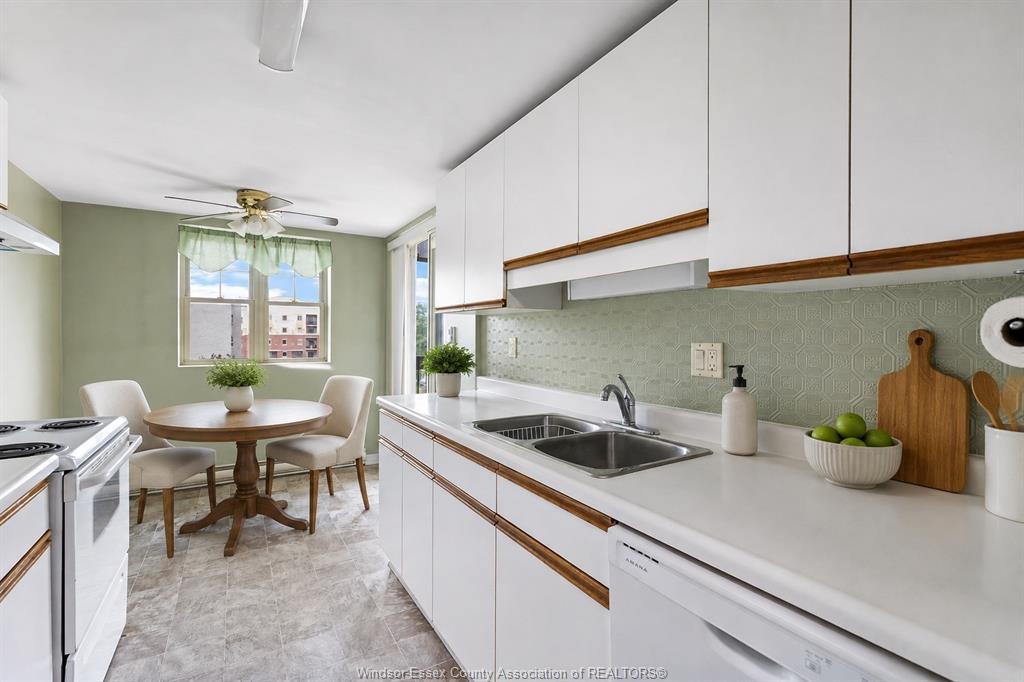 502-1905 Normandy, Lasalle, ON - Indoor Photo Showing Kitchen With Double Sink