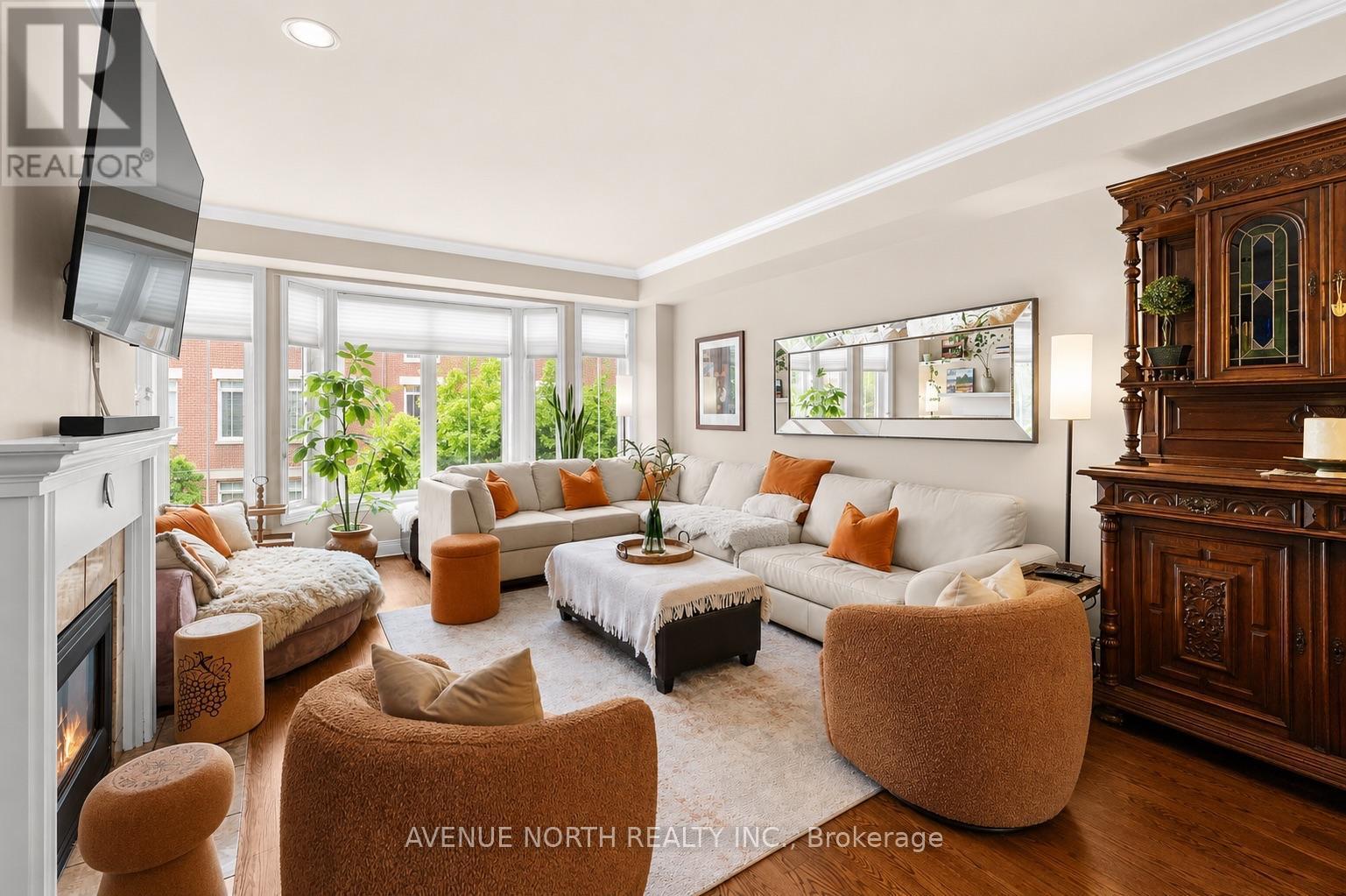 52 Kings Landing Private, Ottawa, ON - Indoor Photo Showing Living Room With Fireplace