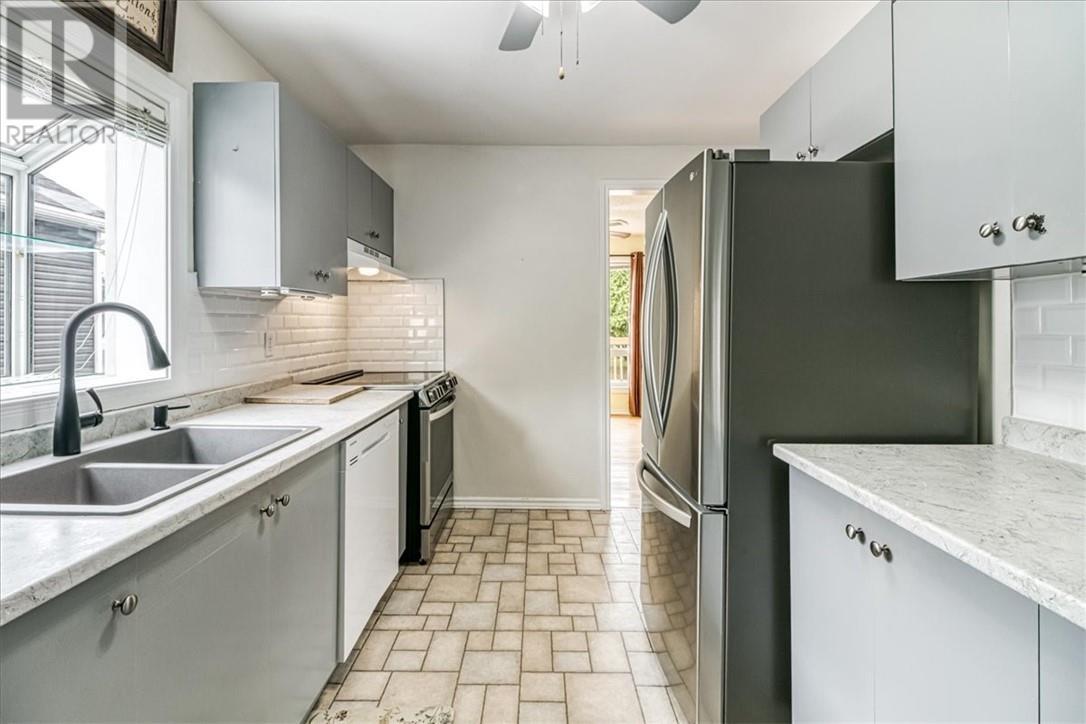 75 O'Donaghue Drive, Garson, ON - Indoor Photo Showing Kitchen With Double Sink With Upgraded Kitchen