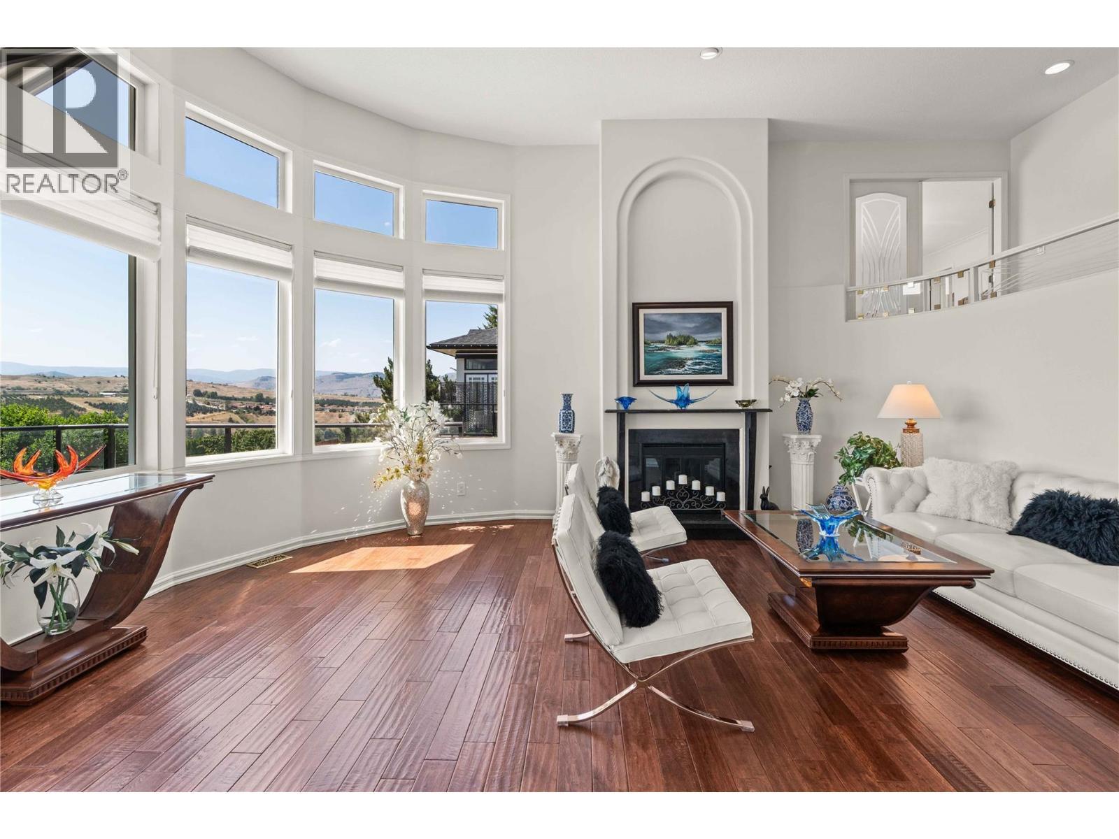 759 Middleton Way, Coldstream, BC - Indoor Photo Showing Living Room With Fireplace