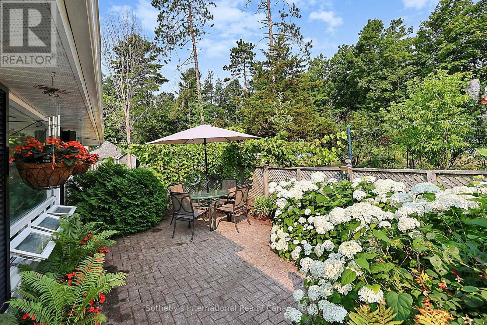 One of two side patios at the main house - 32 Tiny Beaches Road N, Tiny, ON - Outdoor