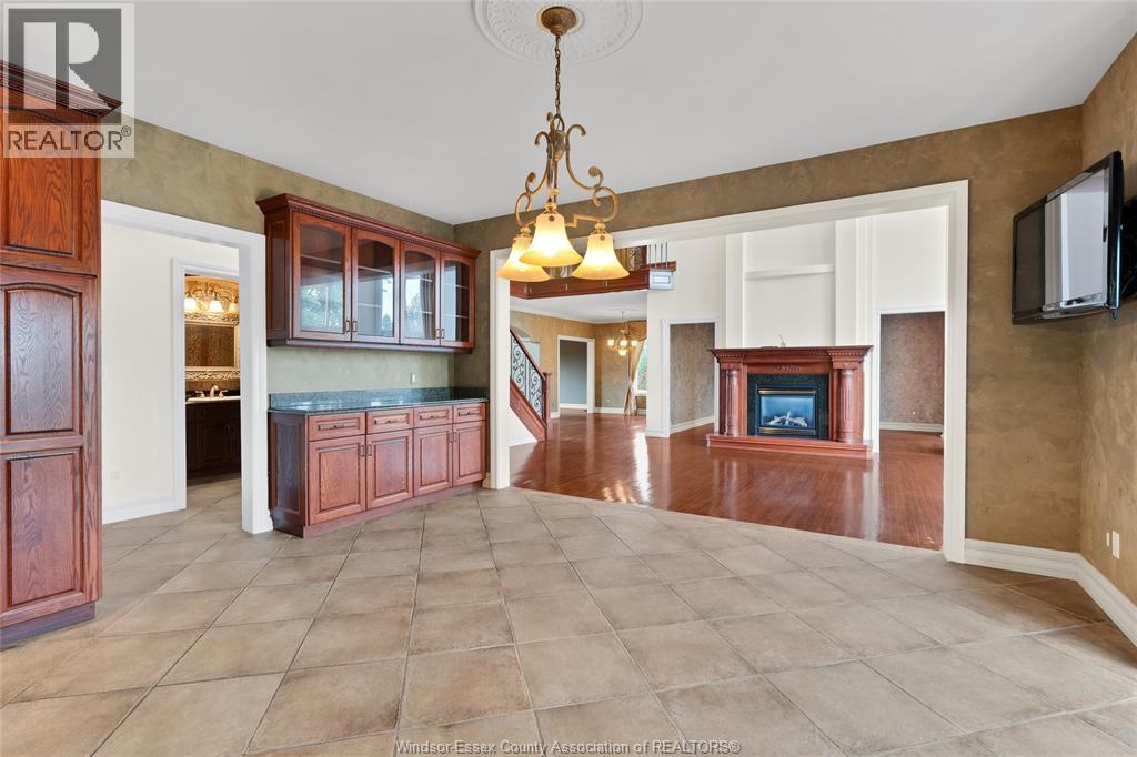 1585 Stoneybrook Crescent, Windsor, ON - Indoor Photo Showing Other Room With Fireplace