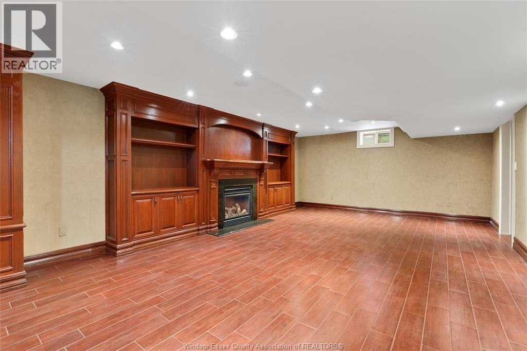 1585 Stoneybrook Crescent, Windsor, ON - Indoor With Fireplace