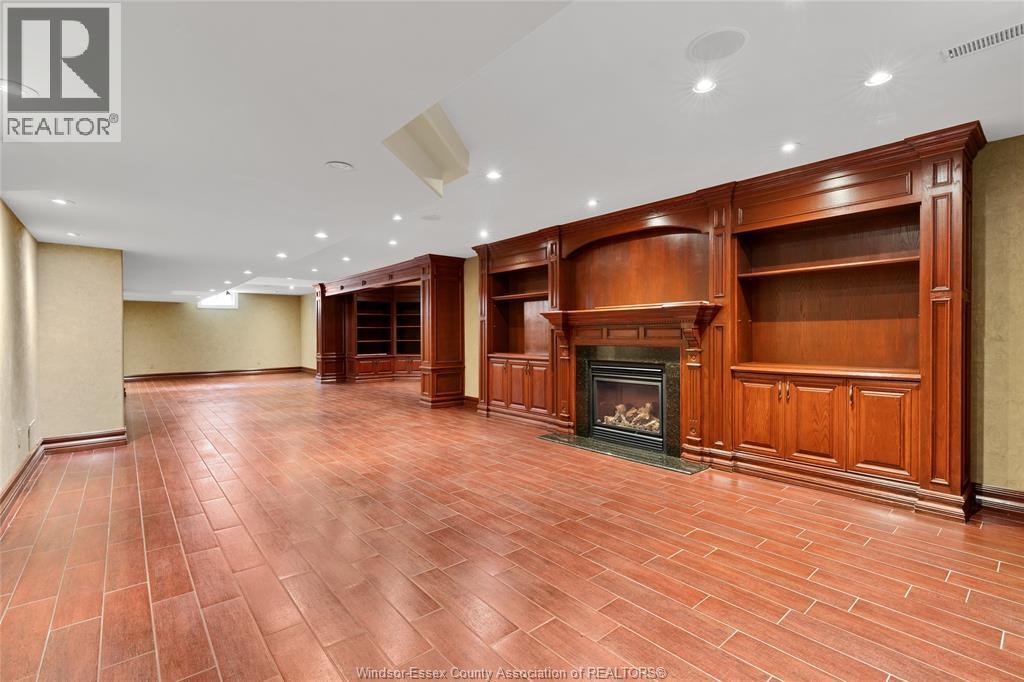 1585 Stoneybrook Crescent, Windsor, ON - Indoor With Fireplace