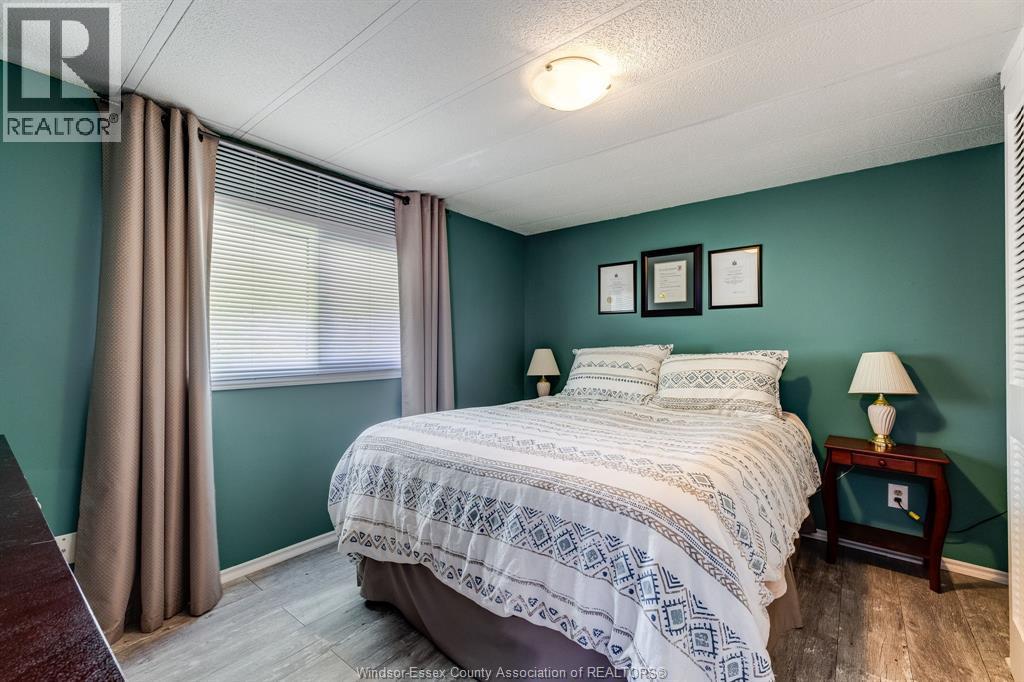 105 Brooks Boulevard, Lakeshore, ON - Indoor Photo Showing Bedroom