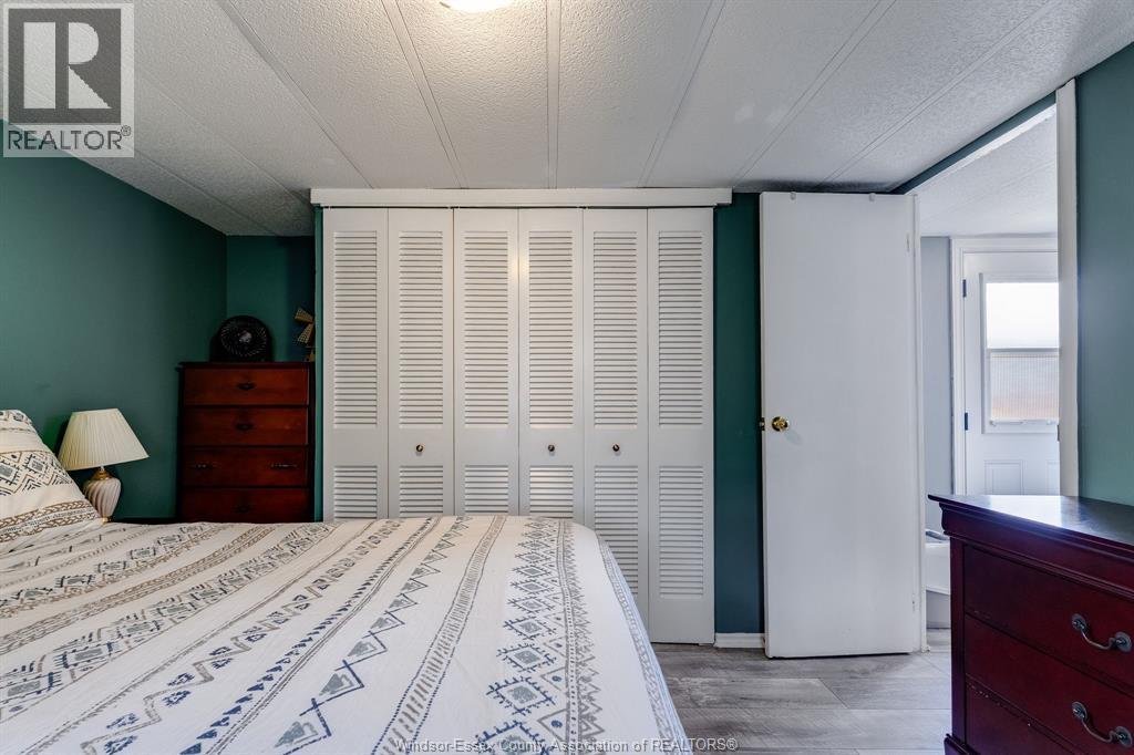 105 Brooks Boulevard, Lakeshore, ON - Indoor Photo Showing Bedroom