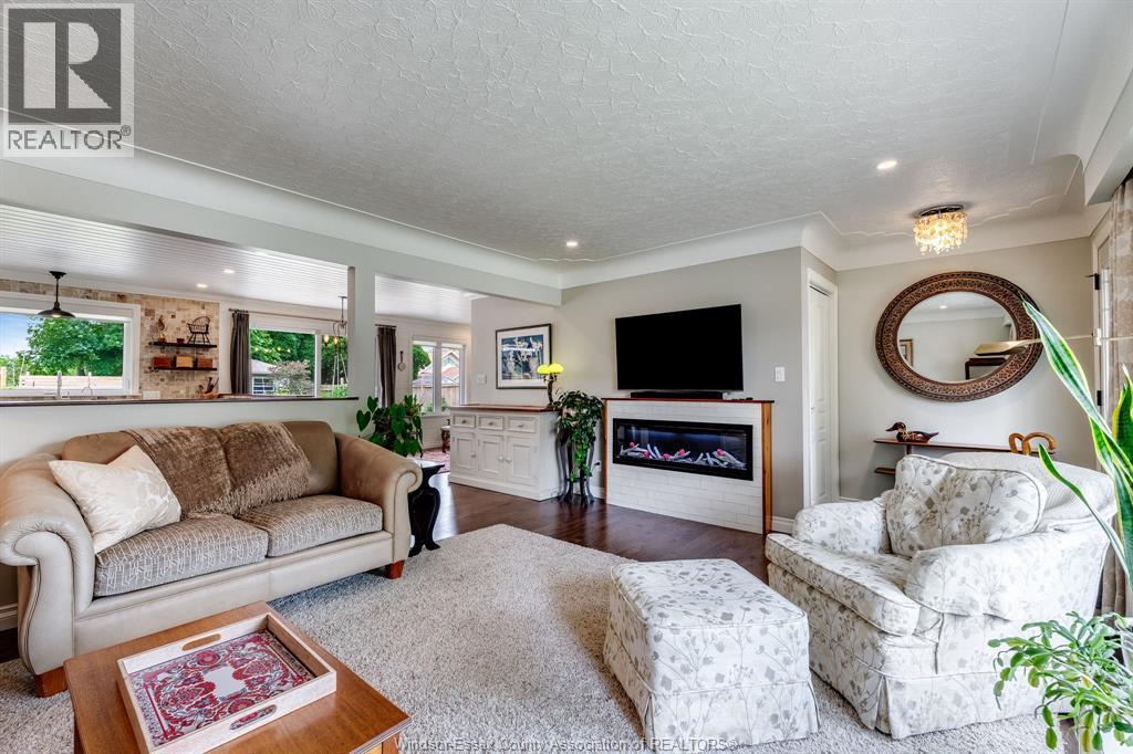 9 Margaret, Leamington, ON - Indoor Photo Showing Living Room With Fireplace