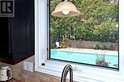 Pool view from kitchen sink - 