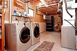 Spacious laundry rm/utility rm - tons of storage!! - 