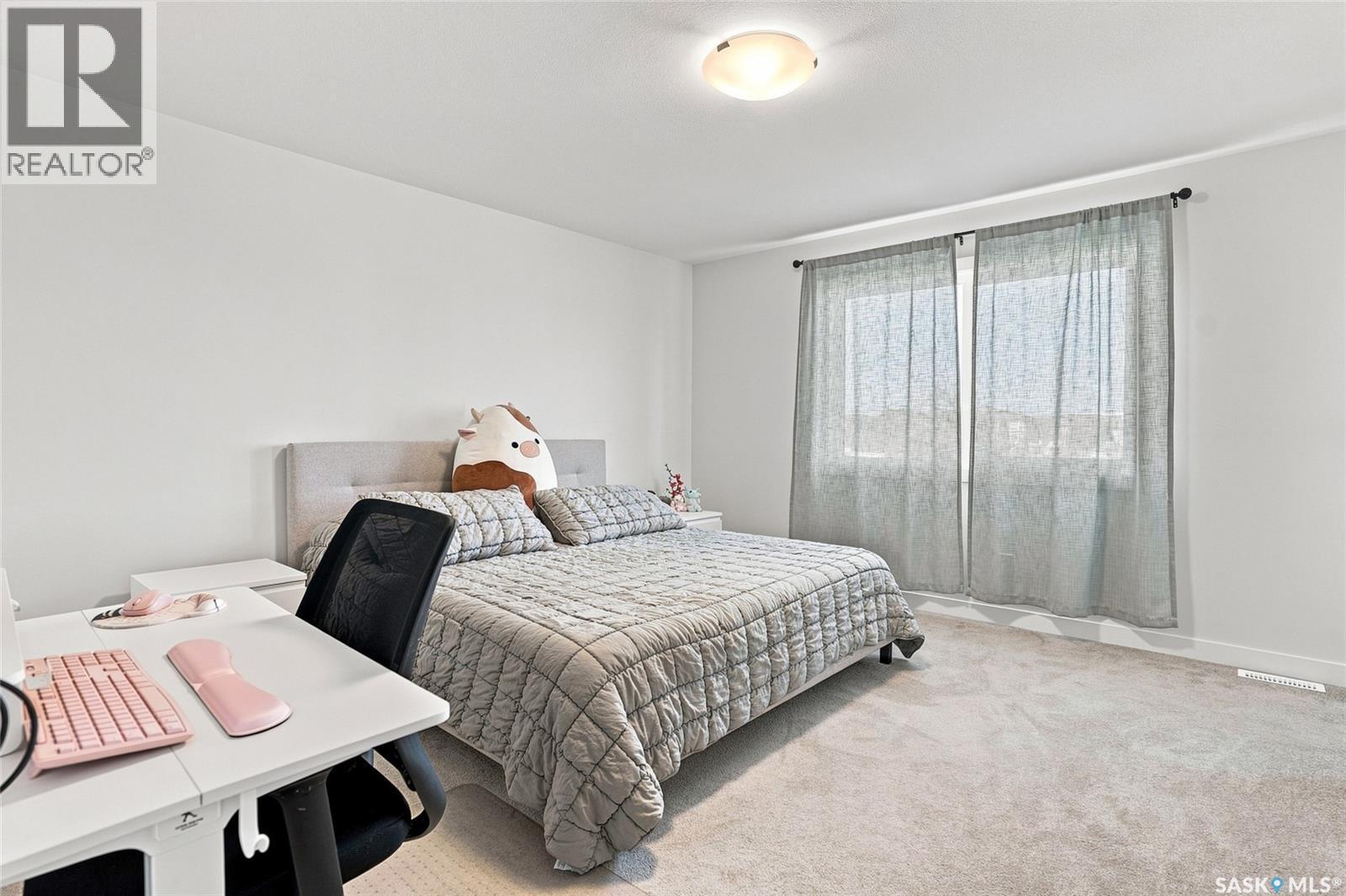 65 651 Dubois Crescent, Saskatoon, SK - Indoor Photo Showing Bedroom