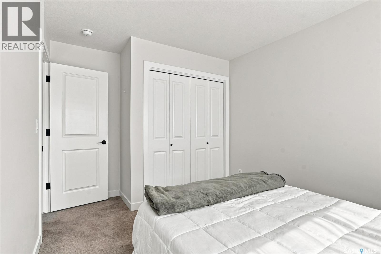 65 651 Dubois Crescent, Saskatoon, SK - Indoor Photo Showing Bedroom