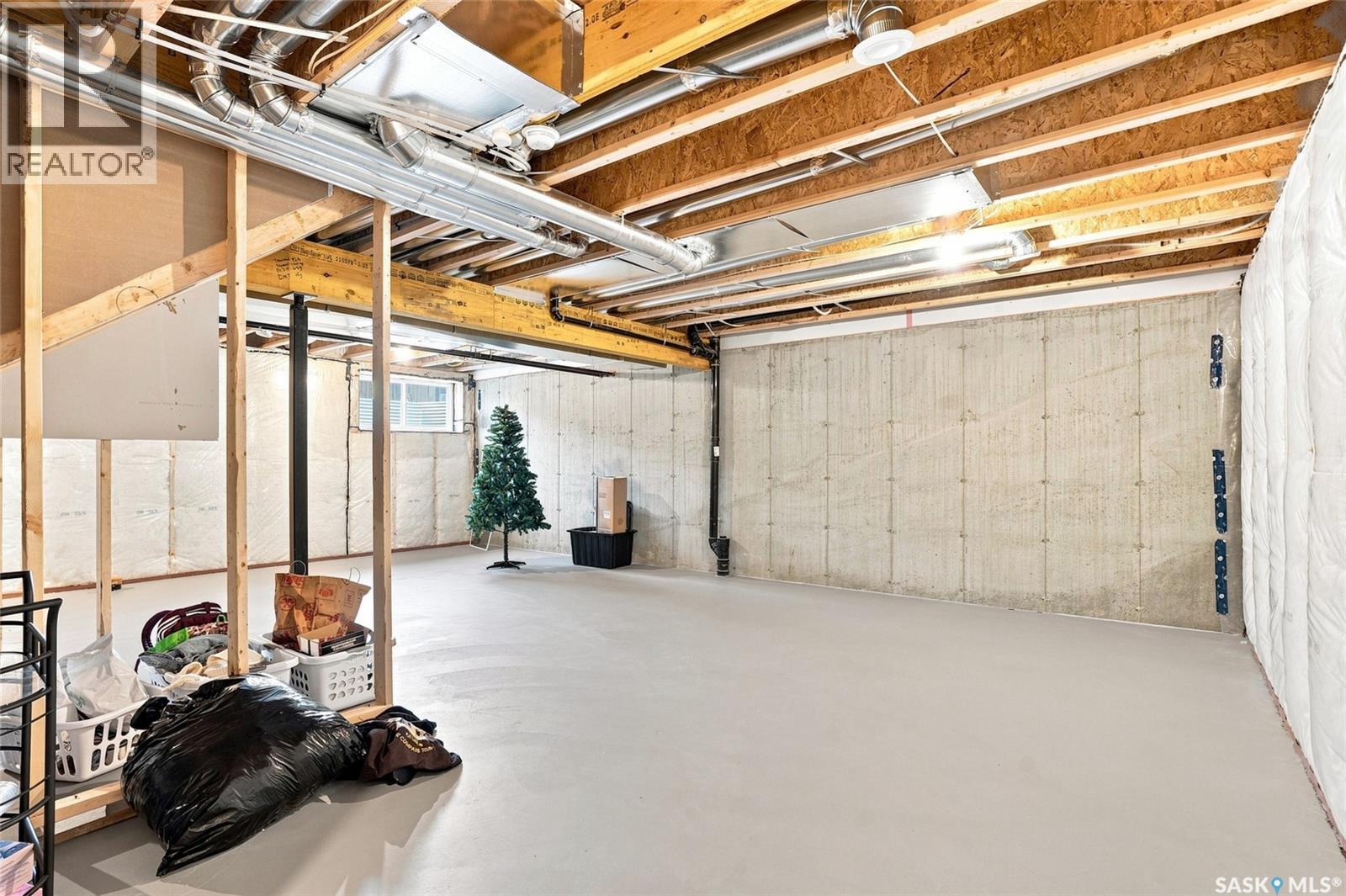 65 651 Dubois Crescent, Saskatoon, SK - Indoor Photo Showing Basement
