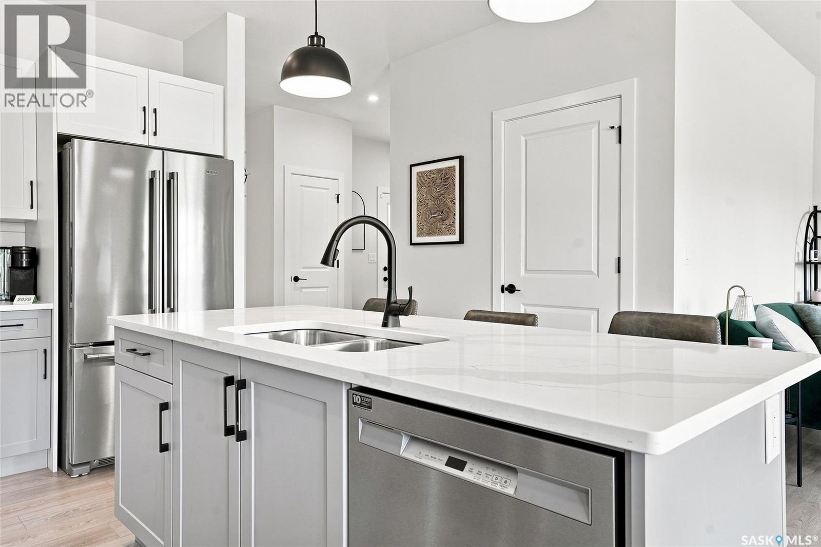 65 651 Dubois Crescent, Saskatoon, SK - Indoor Photo Showing Kitchen With Stainless Steel Kitchen With Double Sink With Upgraded Kitchen