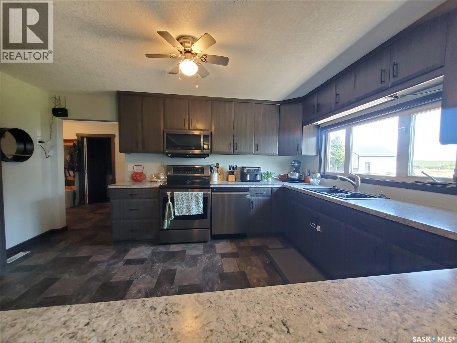 Neville Acreage, Neville, SK - Indoor Photo Showing Kitchen With Double Sink